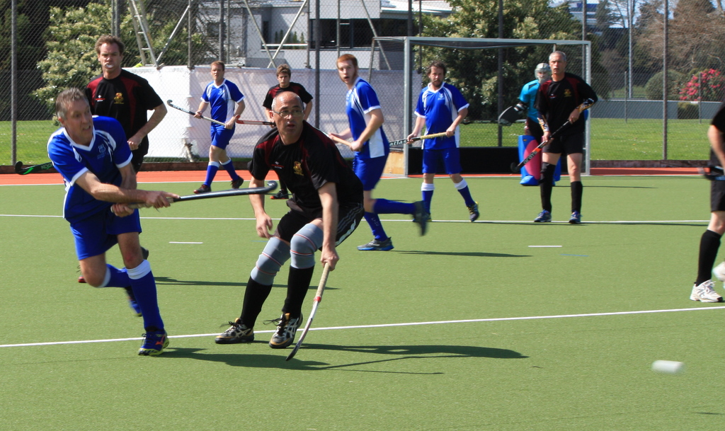 Life Member Pete Nichol distributes the ball through the center during the Insight Reserve Men Championship Final against New World Old Boys.